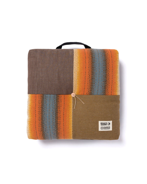 Shop Peace Cabin x Parks Project Wander at Sunset Camp Cushion | brown