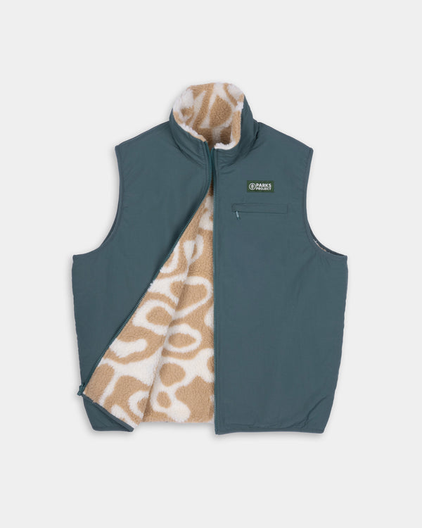 Shop Yellowstone Geysers Reversible Vest Inspired by Yellowstone National Park | khaki-and-green